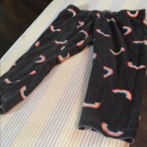 Black pants with rainbow on them